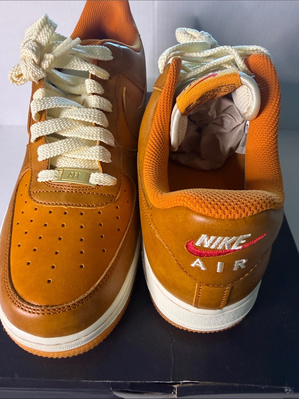 Nike Air Low-Top Sneakers in Tan and Orange
